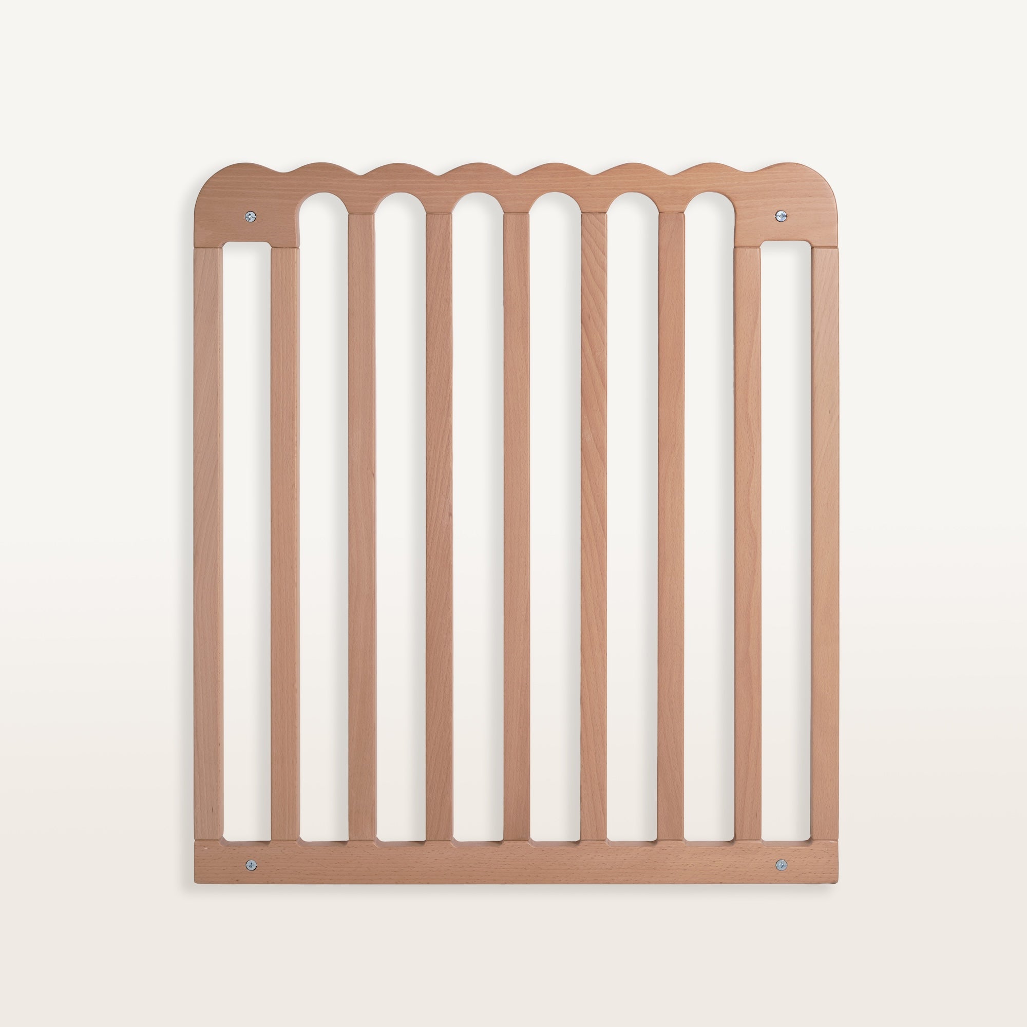 Wooden baby gate on a white background