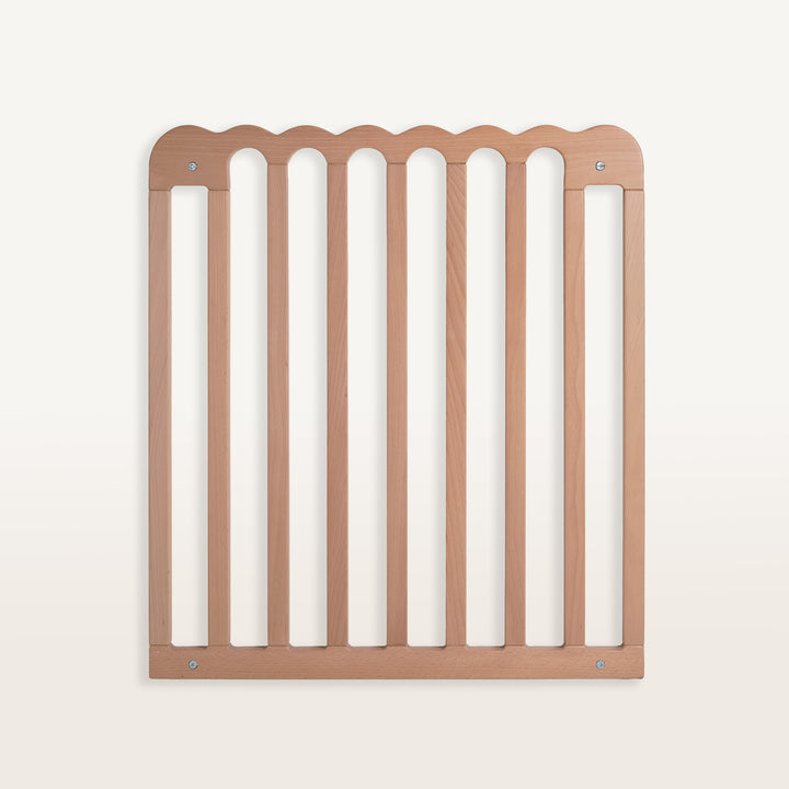 Wooden baby gate on a white background
